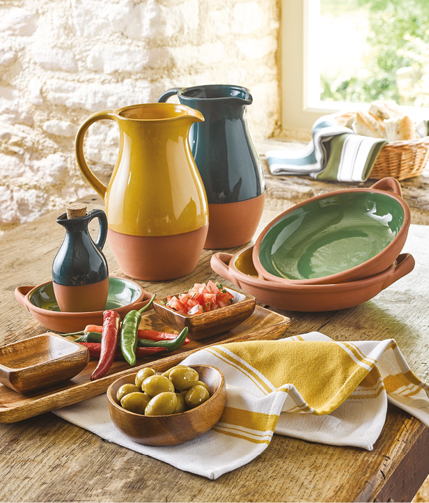 A homeware display styled in a smart town and country aesthetic.